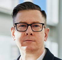 Alexander Hughes CEO portrait crypto trading company executive